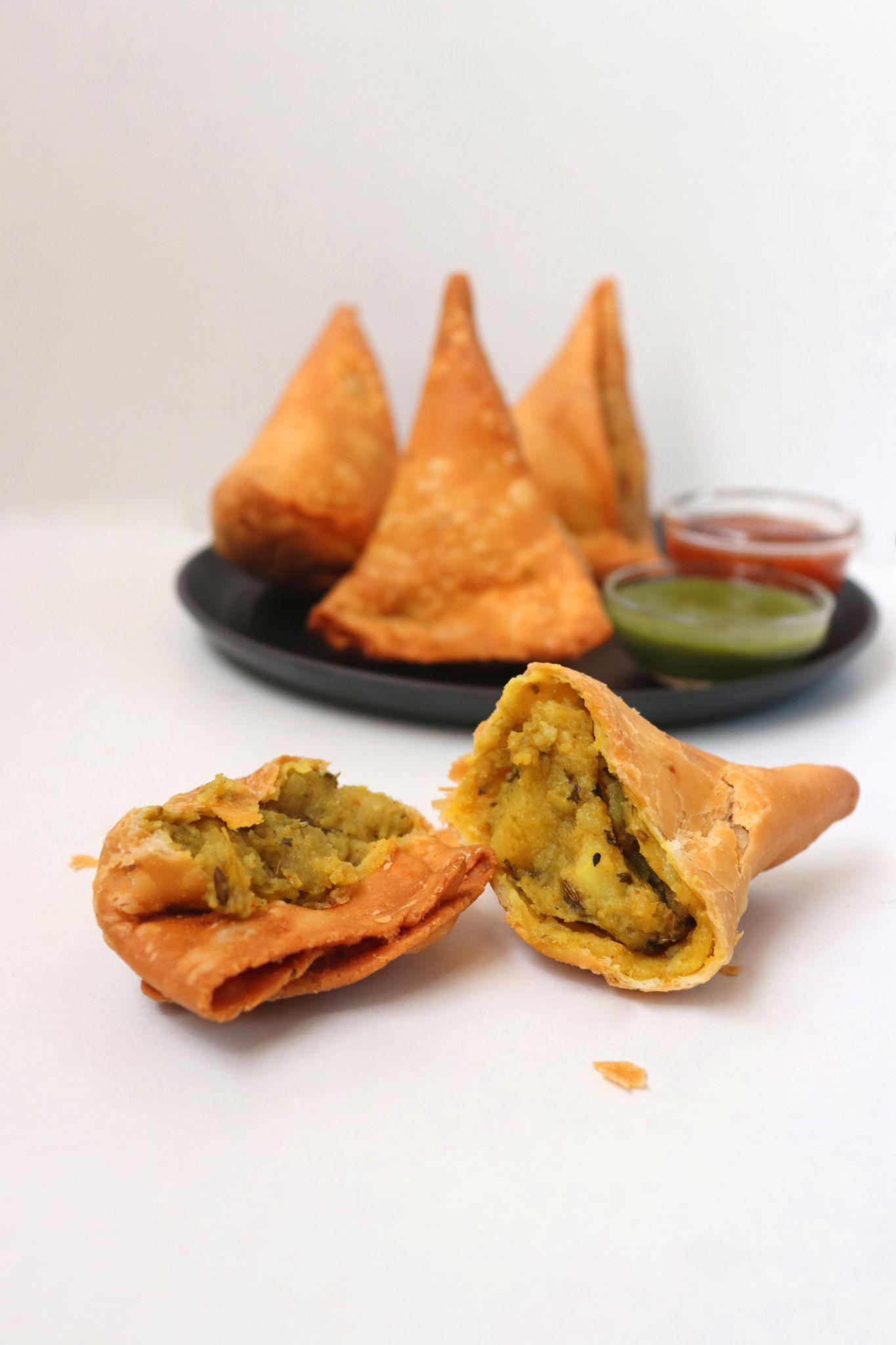 Samosa Plate - Crispy samosas with chutneys at Capital Sweets Winnipeg